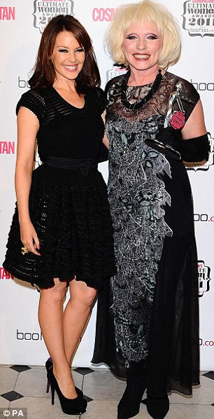 Winners: Alexandra Burke stood with with Kirstin Hallenga, who was holding her award for Ultimate Campaigner, while Kylie Minogue accompanied Debbie Harry, who was voted Ultimate Icon