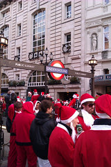 Santas at Piccadilly Circus Tube - Santacon 2011