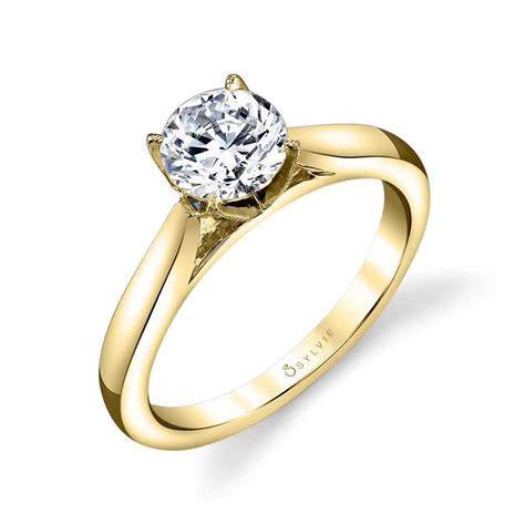 Whether you're just getting on the rose gold train or are a longtime pinkish metal obsessive, we've rounded up 14 pieces any jewelry fiend will love. Modern Solitaire Engagement Ring - Aubree