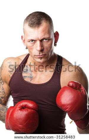 muscular young man in boxing gloves, 