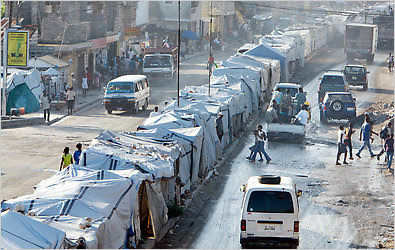 Hundreds of families live on the median strip of a road in the Port-au-Prince area.