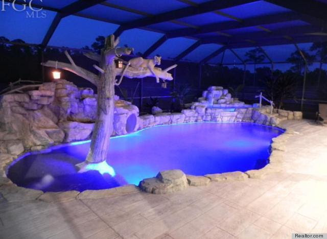 6 Epic Water Slides That Make A Lavish Swimming Pool Even Better (