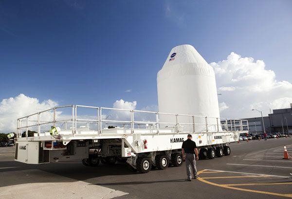 At NASA's KSC in Florida, the full-size Orion test article departs from the OCF in the KSC Industrial Area, on November 14, 2012.