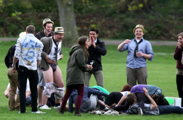 Public display: Some students were seen acting out sexual positions, while male students chanted and ran around with their trousers round their ankles