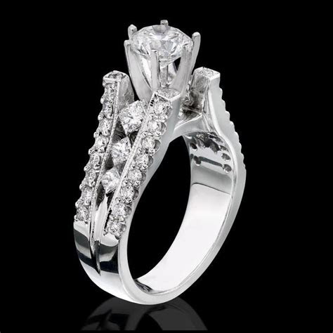 The ring has a low profile and is designed . Diamonds On The Tips Modified 6 Prong Cathedral Split Band
