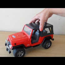 Jeep Wrangler Red Sport utility vehicle By Bruder Toys