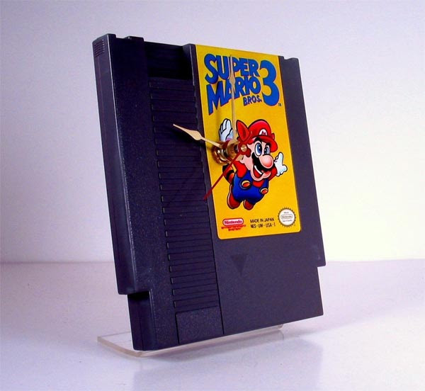 This fun Super Mario Bros 3 NES Catridge Clock is made from a recycled NES 