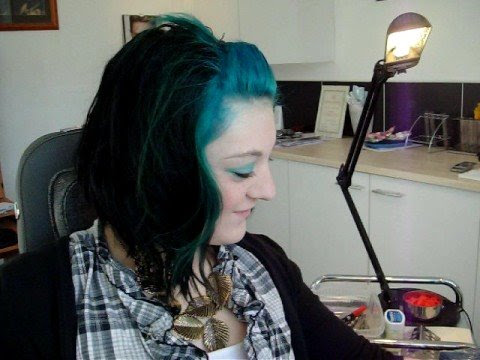 Me in the process of getting my first ink/tattoo!:) The only way I can think of describing the pain is like a constant bee sting. It hurt most in the center 