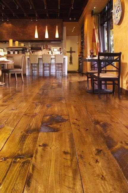 It can also be a pain if you aren't sure what types of old hardwood floors, or softwood, you are dealing w. Distressed Pine Flooring Sets the Backdrop for Italian