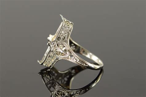 Here's what you're really up against. 14K 18x9mm Vintage Antique Filigree Setting Mounting White