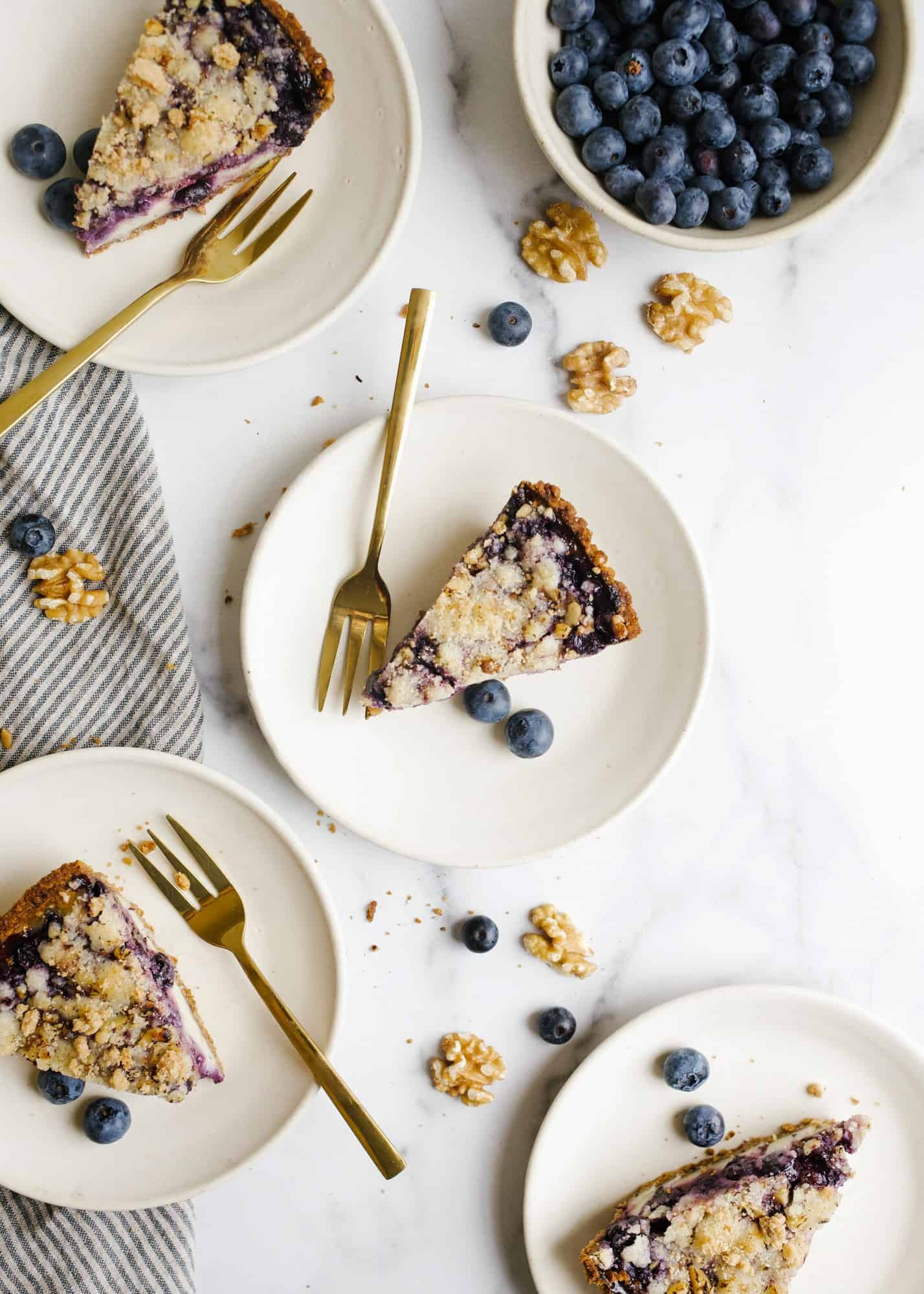 Blueberry Sour Cream Pie. This is a walnut pie crust made with a sweet sour cream filling and fresh cinnamon scented blueberries. The crumb topping adds flavor and texture as well as extra walnuts! Use a ready made crust and this simple pie has less than 10 ingredients and 10 minutes prep time. Find this simple summer recipe on thewoodandspoon.com