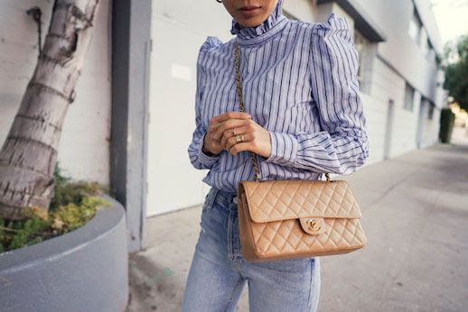 Le Fashion Blog Aimee Song Detail Shot Light Blue Striped Ruffle Neck Blouse Tan Chanel Bag Light Wash Jeans Via Songofstyle 