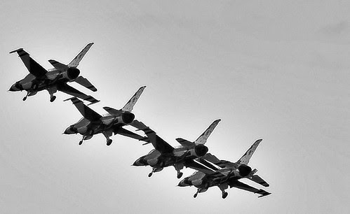 Landing gears down by Tom C. Frundle