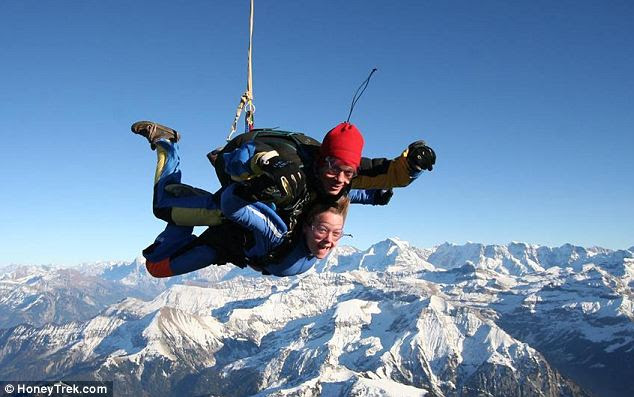 Ready for their close-up: As well as 39 scuba dives the trip included an adrenalin-fuelled sky dive