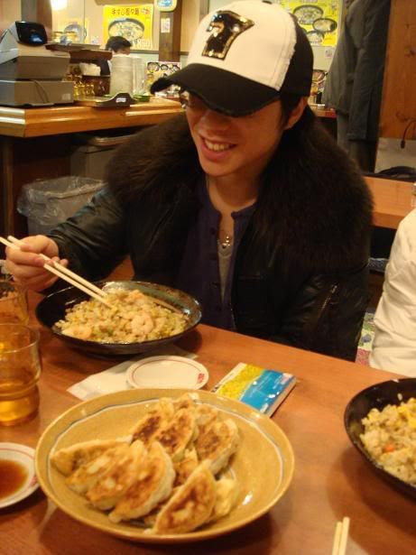 James pigging out on fried rice and gyozas