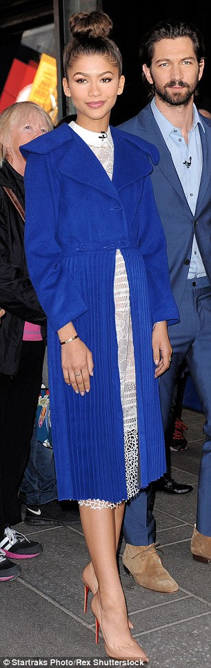Wardrobe change: Zendaya was seen in three different outfits in New York on Wednesday, including a semi-sheer lacy floral dress with nude pumps and a semi-sheer plaid frock with red pumps