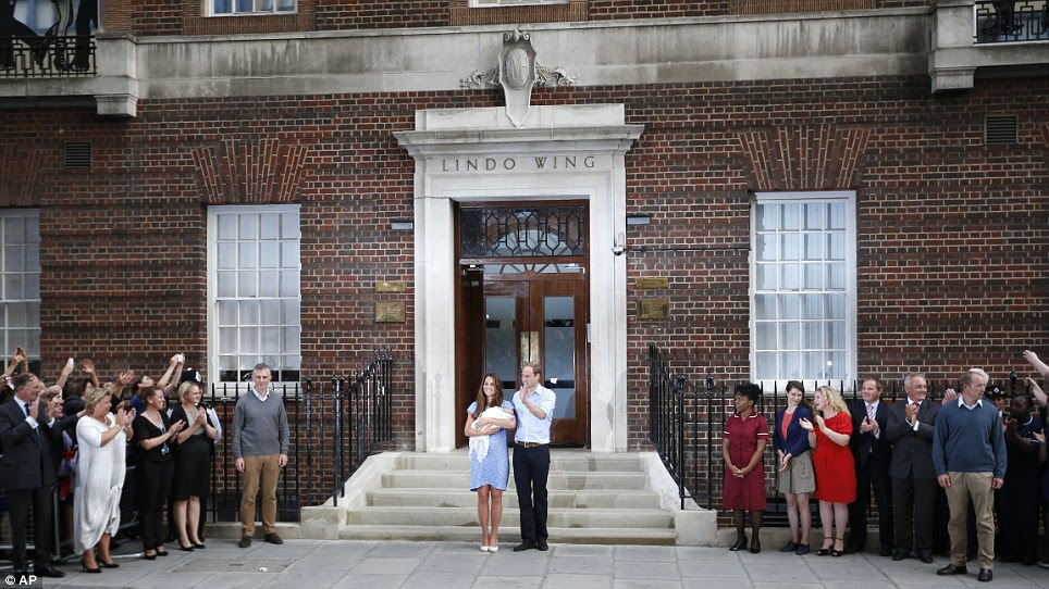 Magic: With the world watching, Kate and William hold their prince outside the Lindo Wing in a genuinely historic moment for Britain