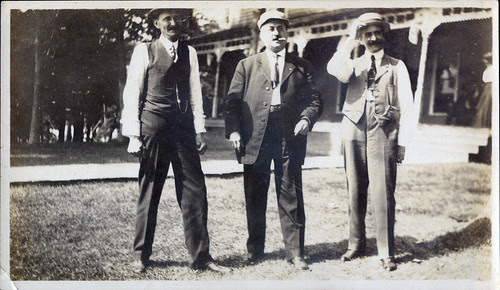 Three men and a cigar