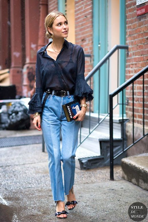 Le Fashion Blog Street Style Pernille Teisbaek Nyfw Ruffle Cuff Blouse Olympia Le Tan Embroidered Clutch Vetements Jeans Sandals Via Style Du Monde