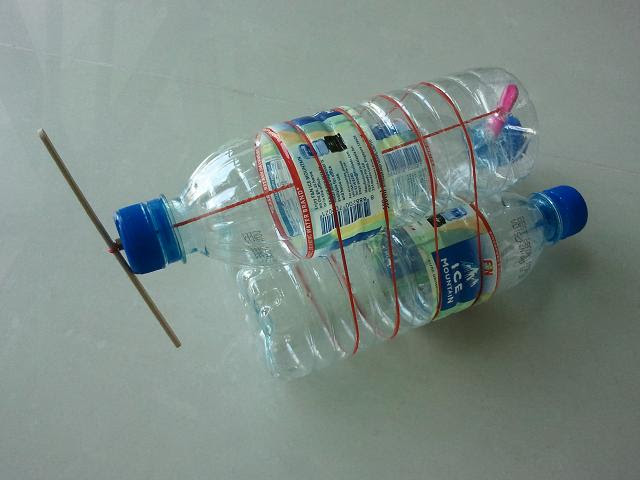 ... build a toy boat with these criteria: uses recycled materials, floats