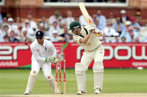 Australia's Michael Clarke, right, is bowled out by England's Graeme Swann during the final day of the second Ashes Test cricket match at Lord's cricket 