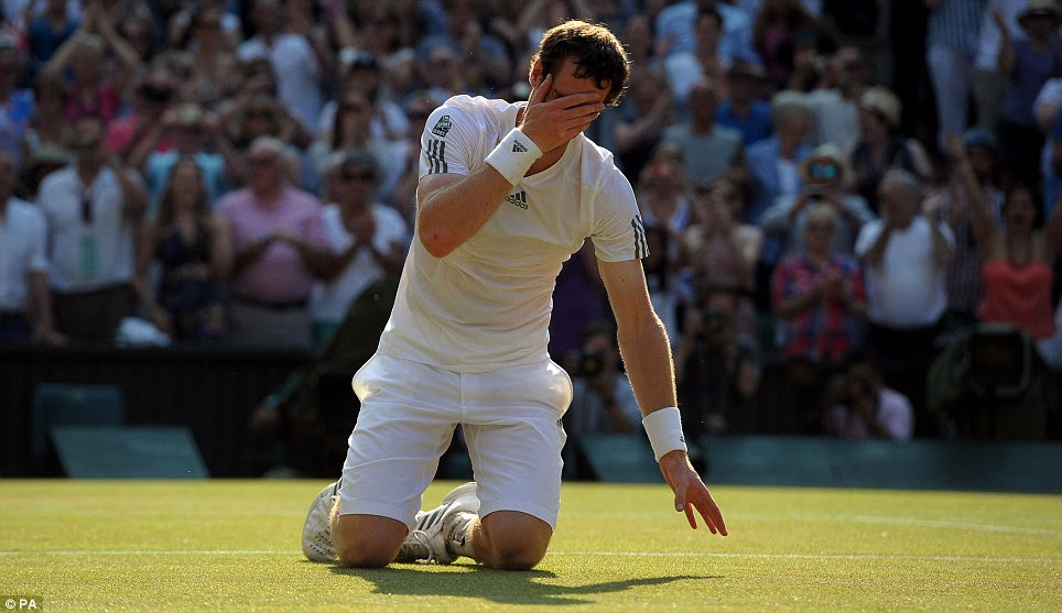 Sheer relief: Andy Murray collapses to his knees after beating Novak Djokovic in three straight sets 