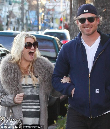 Sharing a joke: The couple were seen laughing as they left the Italian eatery 