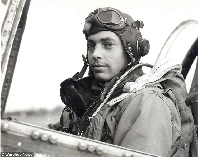 Hero: World War II Aviator Bill Overstreet Jr., best known for flying beneath the Eiffel Tower in pursuit of a German plane, is pictured in his military days. He passed away in Virginia on Sunday, aged 92