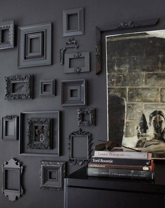 Grey wall with frames painted the same color. Hmm...