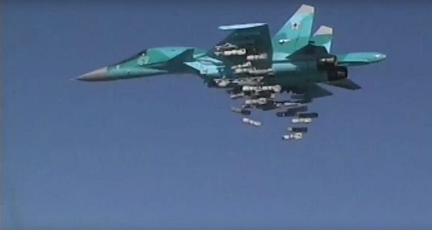 A Russian Sukhoi Su-34 fighter-bomber based at Hamedan airbase in Iran releasing its payload while carrying out airstrikes in the Deir ez-Zor province of Syria. Until last week Russia and Iran were the military mainstays of the overstretched and undermanned Syrian army. Photograph: EPA 