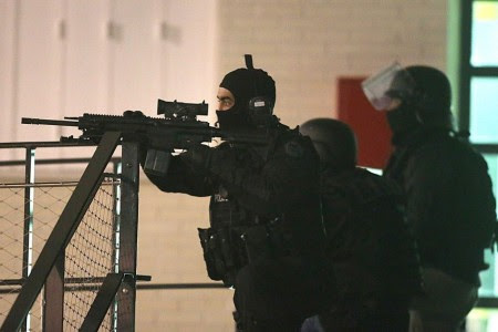 Armed police at Reims (photo by Francois Nascimbeni - taken from abc.net.au)