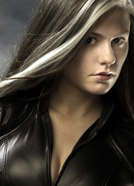 brown hair with blonde streaks in bangs. rown with a londe streak