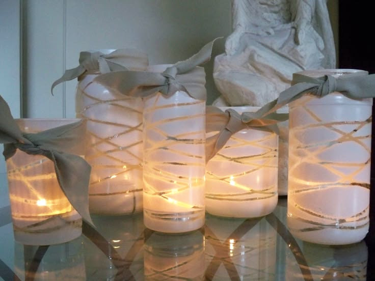 Jars Wrapped in Yarn, Then Spray Painted White. 