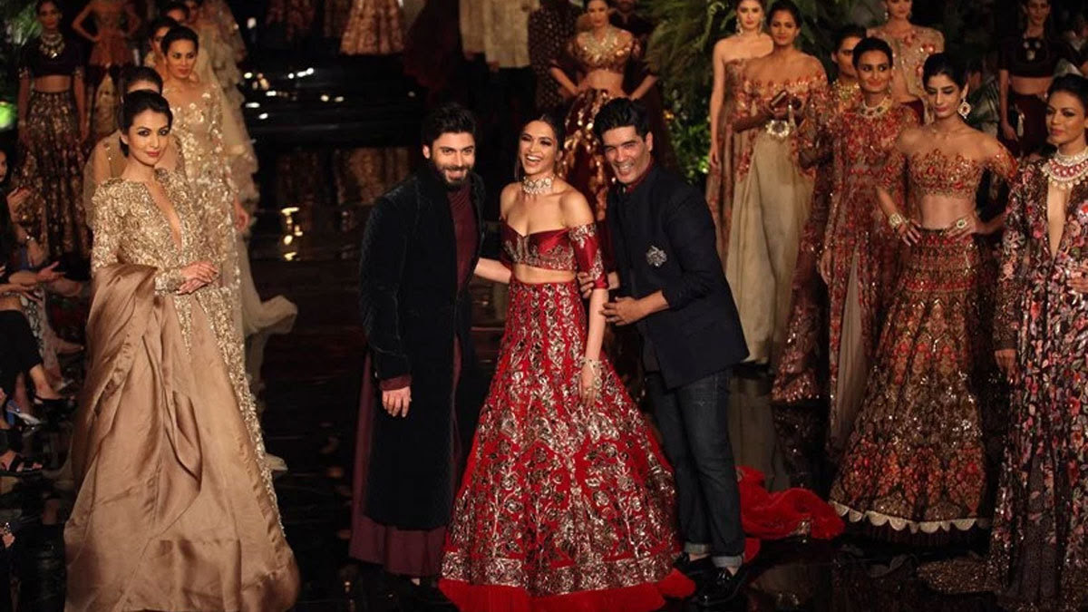The designer with his showstoppers. Photo: IndianExpress