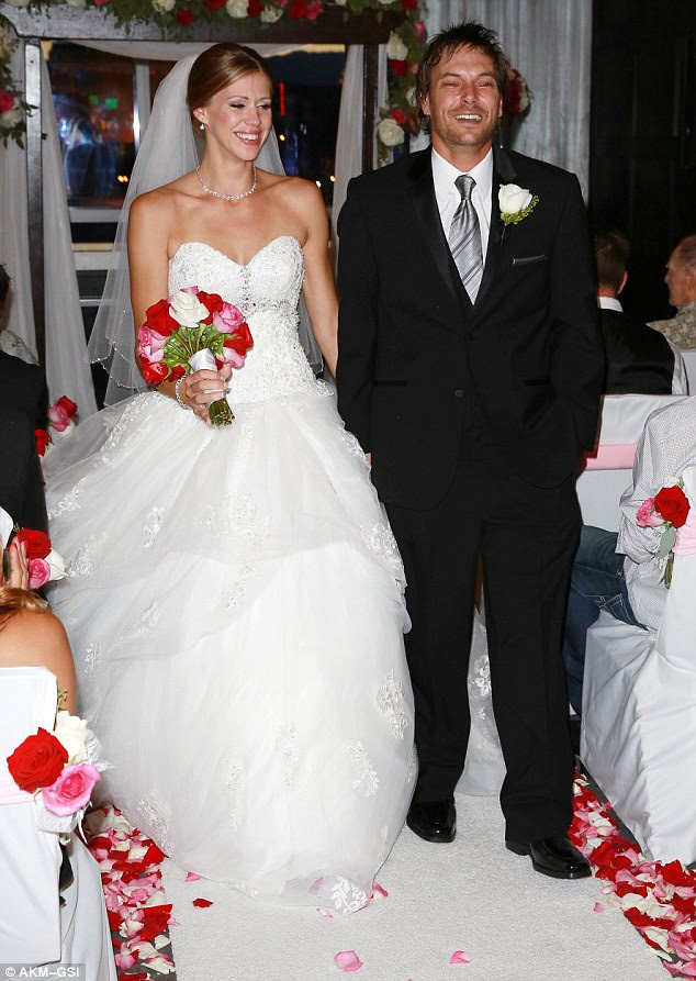 So happy: New pictures of Britney Spears' ex-husband Kevin Federline and his new bride Victoria Prince's Las Vegas wedding have been revealed 