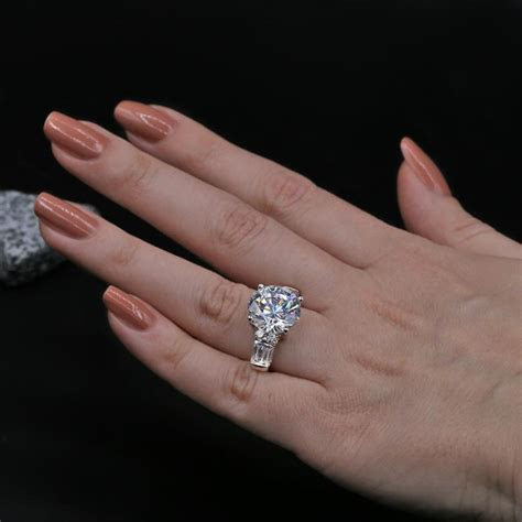 See pictures of diamond engagement rings. Exclusive Platinum Engagement Ring featured with 9.00ct