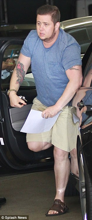 Cause for celebration: Chaz recently announced that he has shed 60lbs over the past two years, and he showed off a trim physique as he arrived at the location
