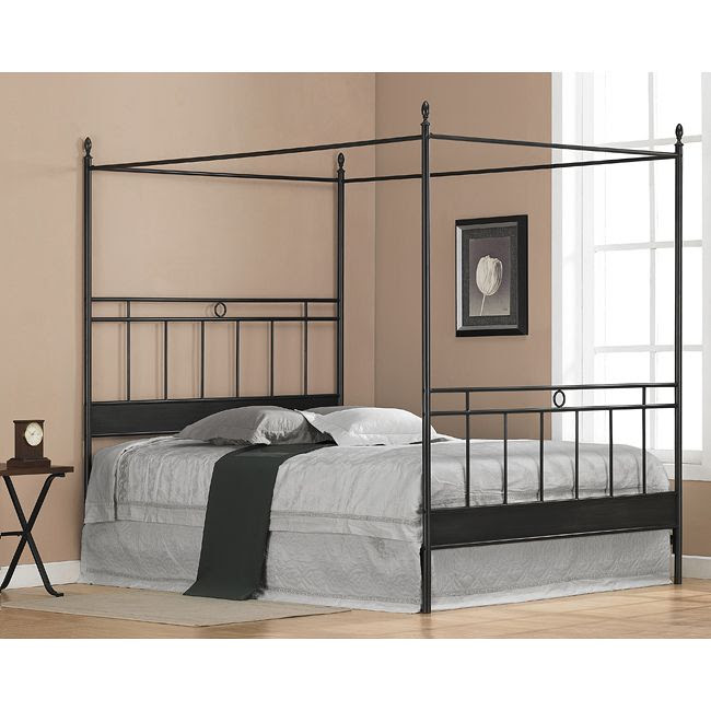hideaway with this black metal queen-size canopy bed. This bed ...
