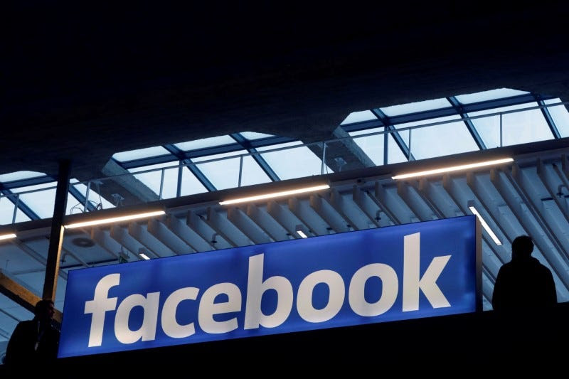 FILE PHOTO: Facebook logo is seen at a start-up companies gathering at Paris' Station F in Paris, France on January 17, 2017. REUTERS/Philippe Wojazer/File Photo 