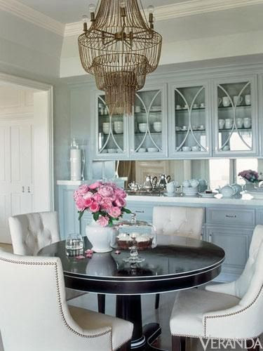dining rooms - blue gray cabinets round black dining table white