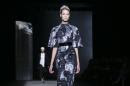 The Monique Lhuillier Fall 2014 collection is modeled during Fashion Week, Saturday, Feb. 8, 2014, in New York. (AP Photo/John Minchillo)