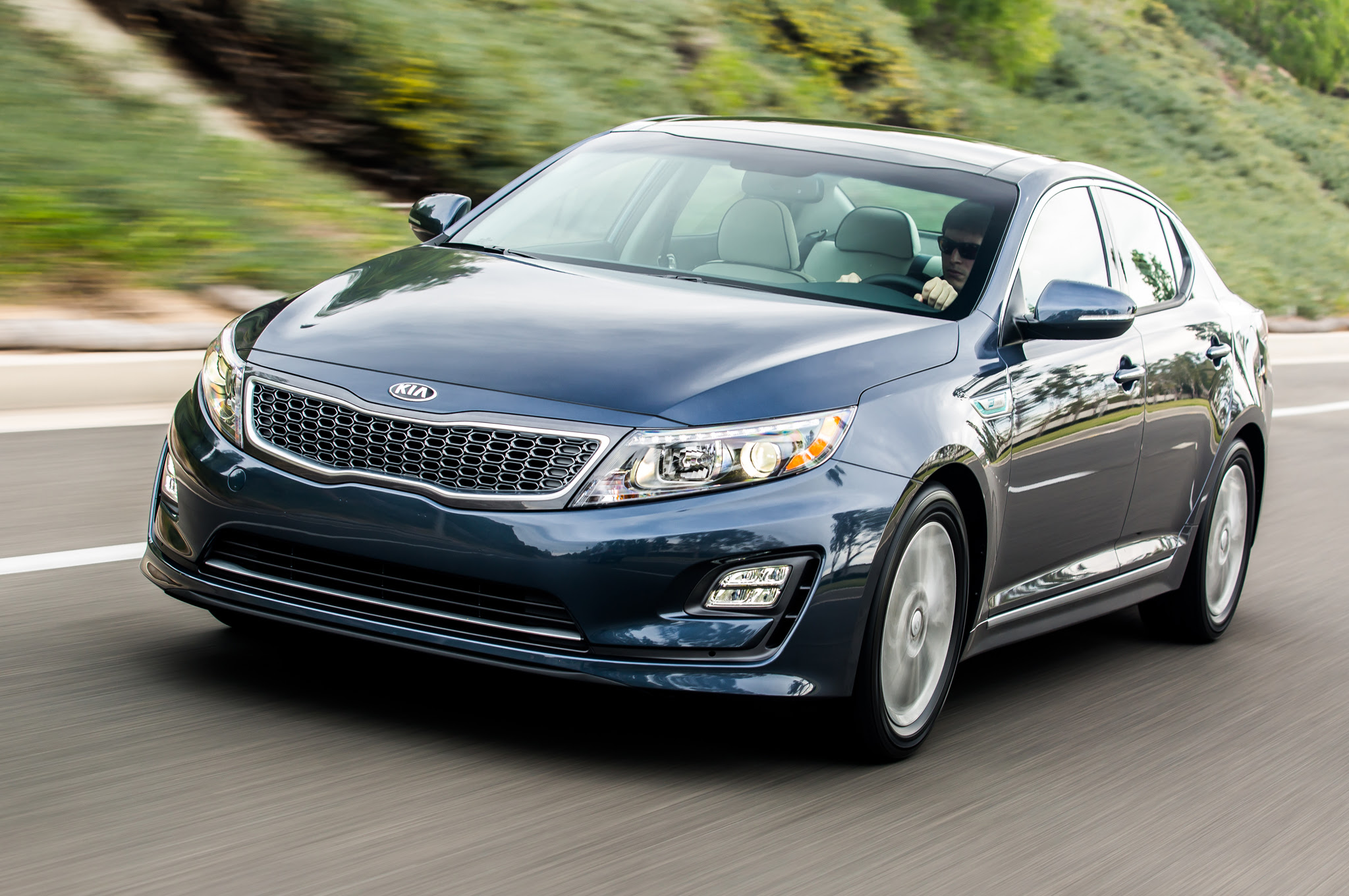 2016 Kia Optima Hybrid front three quarter in motion