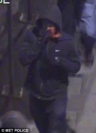 An image of a male joining the group wearing a blue Nike hooded top and red face scarf