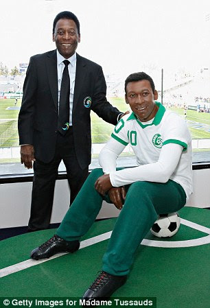 Double vision: Pele met his wax figure at the New York Cosmos' season opener against Atlanta Silverbacks