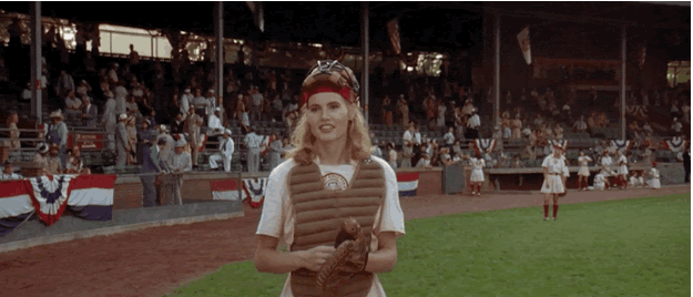 A woman steps forward to pick up the ball, and when she throws it back...