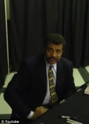American astrophysicist Neil deGrasse Tyson (pictured) has defended GMOs, saying that people should 'chill out'