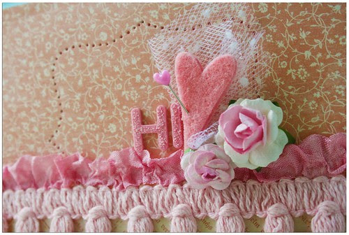 A pink Hi card closeup