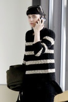 Rooney Mara gets ready to depart from LAX airport with her boyfriend, March 15, 2012