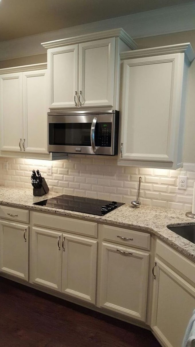New Venetian Gold Granite Bathroom - Ultra White > Quantum Quartz > Quantum Quartz, Natural / New venetian gold is a light warm yellow granite with brown burgundy dots and light veining.