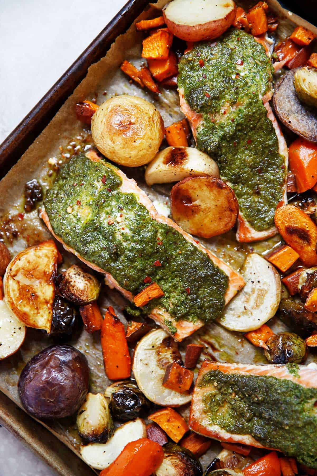 Sheet Pan Salmon With Sage Pesto And Root Vegetables Lexi S Clean Kitchen
